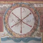 Modern restoration of the fresco containing the Christian symbol of the Chi Rho from the Roman Villa at Lullingstone, now at the British Museum, London.